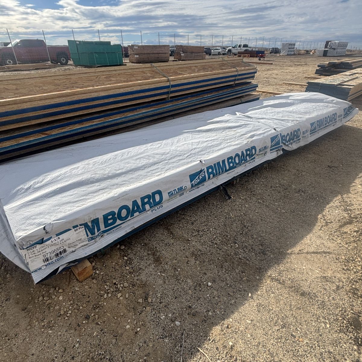 APA-rated 1-1/8 inch by 9-1/2 inch OSB rim board bundle polywrapped and stocked at Boise lumberyard for engineered floor systems