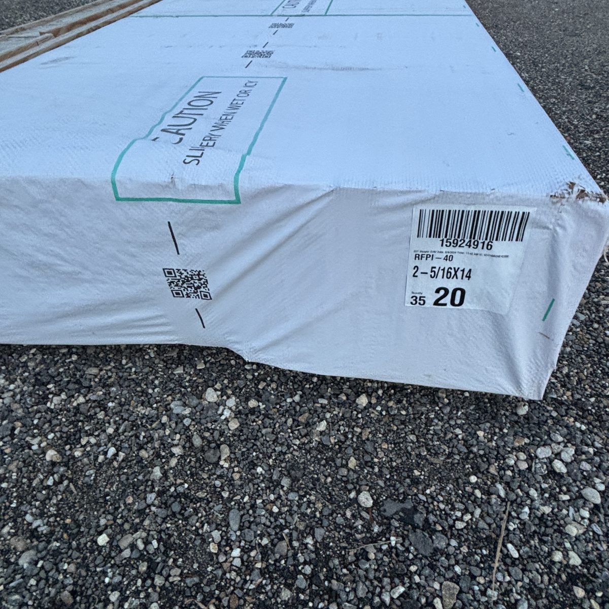 Polywrapped Roseburg RFPI-40 14 inch engineered wood I-joists staged on platform at Boise lumberyard