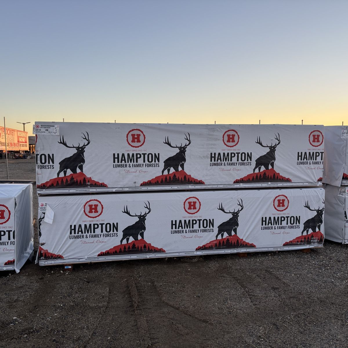 Two units of 2x10x12 foot number 2 grade kiln-dried Hem-Fir lumber stacked at Boise lumberyard