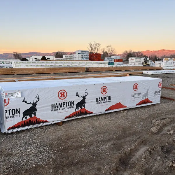 Wide yard view of 2x10x16 foot number 2 grade kiln-dried Hem-Fir lumber stocked at Boise lumberyard