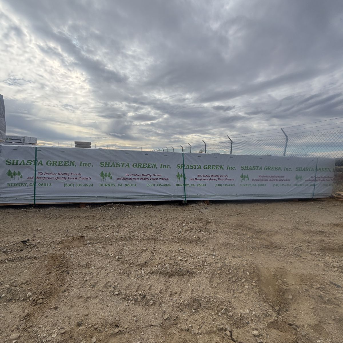 Front view of wrapped unit of 2x10x20 foot number 2 grade kiln-dried Hem-Fir lumber at Boise lumberyard
