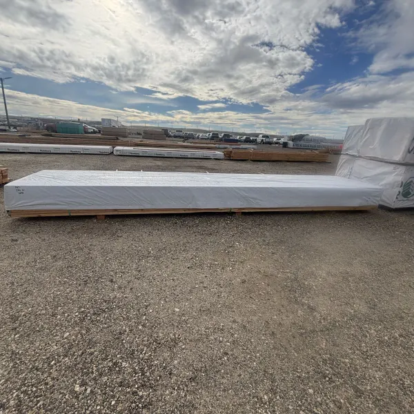 Wrapped full unit of 2×4×20′ #2 kiln-dried Douglas Fir lumber staged at our Boise lumberyard