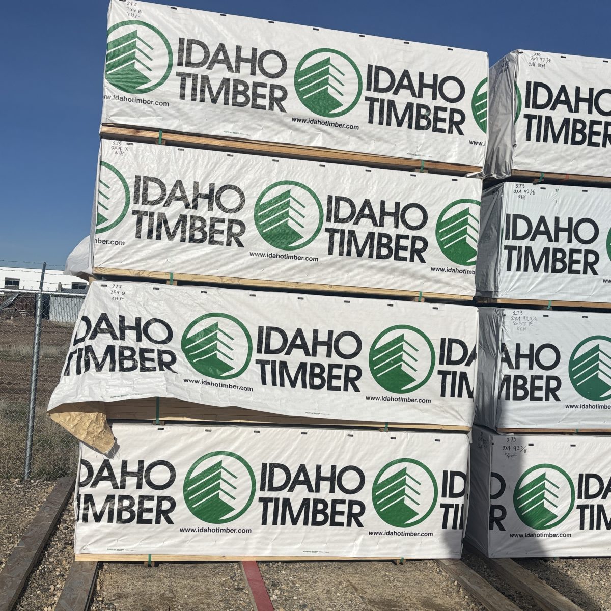 Polywrapped units of 2×4×8′ #2 kiln-dried Hem-Fir lumber staged at our Boise lumberyard