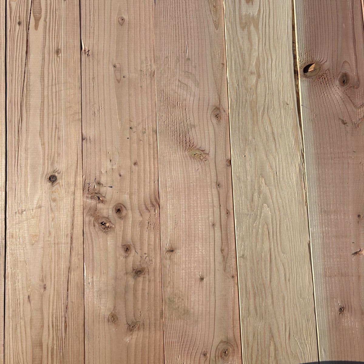 Top-down view of Douglas Fir wood texture on 2×6 #2 kiln-dried lumber showing grain pattern and surface detail