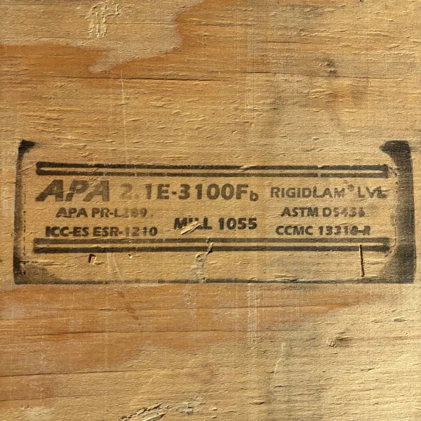 APA certification stamp on LVL beam showing 2.1E rating and structural grade information